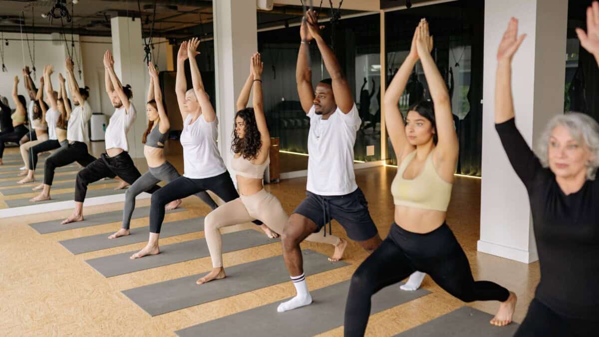 Group of Individuals Doing a Yoga Class Together