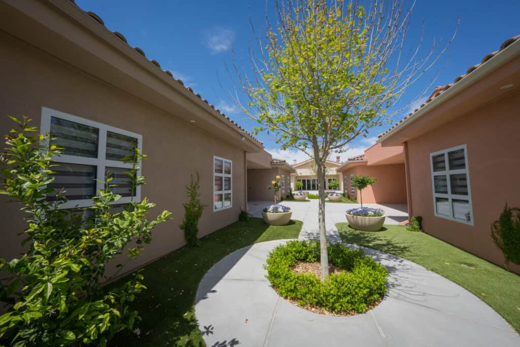 Corbett Walkway Between Villas with Tree