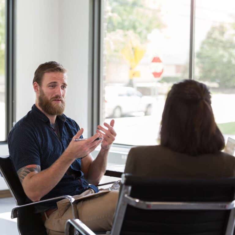 Dual Diagnosis Treatment for OSFED Counselor Meets With Patient